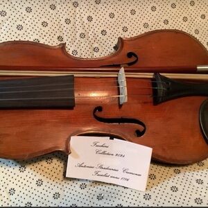 Vintage 1716 Stradivari the label dose not say copy Wooden Violin with bow